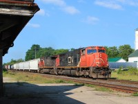 An important personal moment. The second unit, CN 2544, being my 1000th different CN loco. Seen passing the derelict old station with a very mixed freight. 