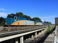 VIA #02 slowly creeps over Finch Avenue East near Bayview Woods, Ontario and just south of Old Cummer GO Station. 02 is closely following the last southbound GO Train into downtown Toronto from Richmond Hill, GO 838, so they had a restricting signal.