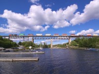 The third of five northbound trains in the span of two hours, CN 2916 leads Q107 across the trestle high above the Seguin River.