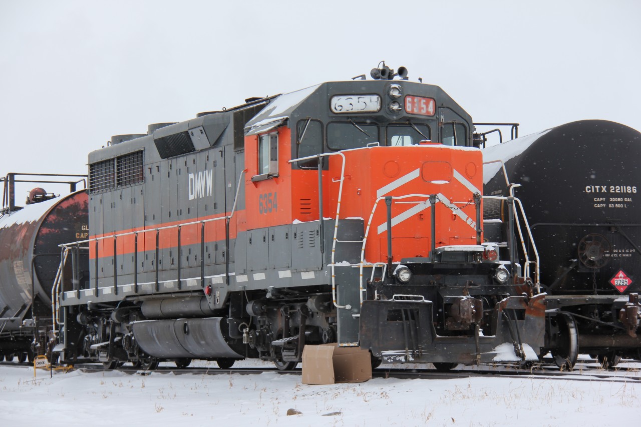 GP35R ex DMVW 6354 parked between switching duties. This locomotive arrived in the summer of 2012 to perform switching of crude oil tanks for Torq transloading at the Northwest terminals grain elevator in Unity.