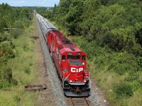  An exceptionally clean CP 2282 leads CP 2257 up to the Highway 6 overpass at MM 44.9 on the Galt sub heading west cleared to Wolverton with a small load of hopper cars.