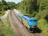  Via 913 rounds the bend and passes MM9 on the Dundas sub, on its way under the Inkster Rd bridge.