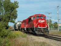 Canadian Pacific 2249 and ex-SOO 4515 pushing three cars on the Saskatchewan Avenue Spur. This track used to be part of a large and complex series of many tracks used by CP and CN, CP from the La Riviere Subdivision, CN from the Oak Point Subdivision. Now only a few tracks remain, plus a small section of the CN Oak Point Sub which is used by CP.