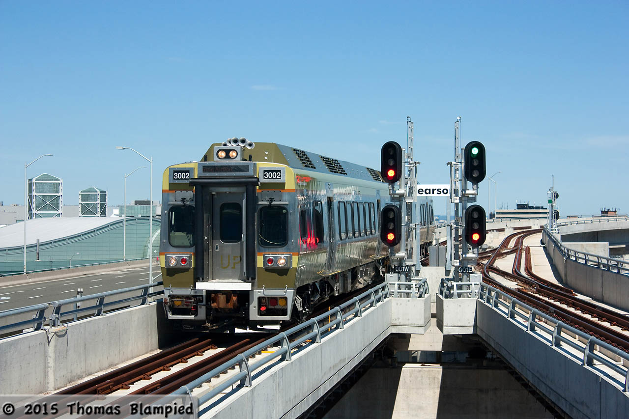 UPX 3002 is seen approaching the Pearson Airport station on the first day of official service on the new Union-Pearson rail link. For anyone who has travelled by train in Europe during the last 20 years, the new DMUs are nothing special, but it is good to see newer rolling stock in Canada. The highlight of the 25 minute journey is the record-breaking elevated portion which connects the airport to the Weston Sub.