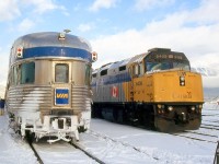 The Canadian's stainless steel Budd "Park" dome-observation-bullet-lounge car meets The Skeena's F40PH-2D 6409, at Jasper AB. VIA #2 and #5 together was not a common meeting, but possible today since #2 had been delayed.