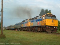 Forget the new stuff - here are MY oldies. I started taking photos a few years prior and Ingersoll was the place to be - or so it seemed. Why? trains went through town at FULL speed... even NS 327/8 and the Roadrailer did every bit of their 70 MPH timetable freight speed, while everything else was restricted to 60 sans passenger. A great place if you want to see full speed action with the amenities of a town a short hop away. Photography was.. well.. it was a nice place to see trains, wasn't it :) <br><br>And a photo that's definitely aged well - VIA 70 with a pair in the old scheme, giving 'er to get up to track speed after a station stop at Ingersoll. I'm sick of the new stuff and I'm going to be going into my archives for a bit. Maybe a few of the gang on here will do the same? Pull out your oldies - this modern stuff is boring! Trains used to be cool, right?