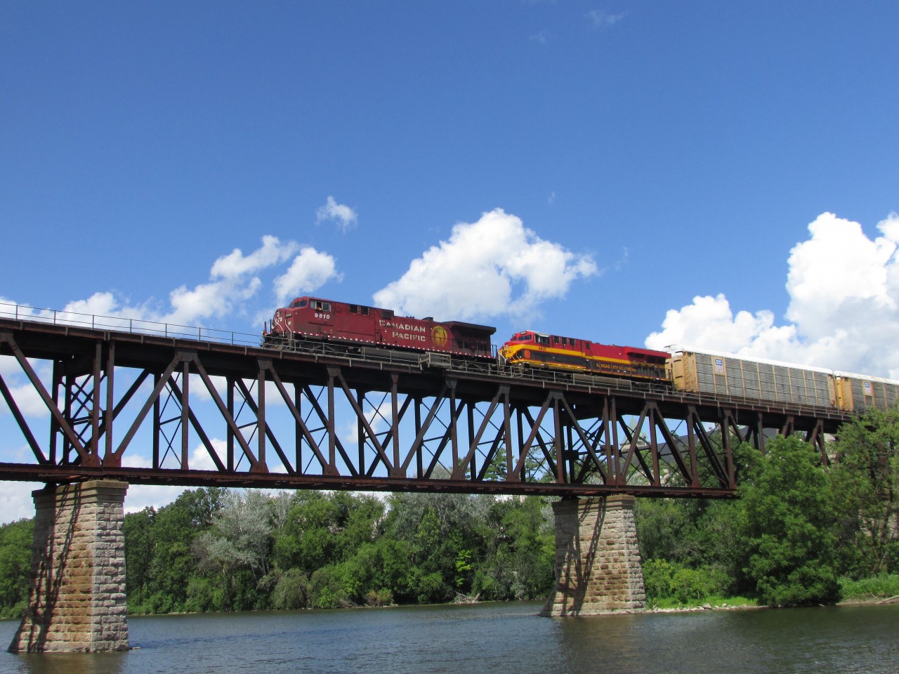 This is where the Canadian pacific Galt subdivision crosses the grand river in Cambridge Ontario Canada. Really good spot to watch trains at! This photo shows CP 241 crossing the bridge with Kansas city southern 4805 in trail.