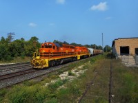 Hearing that 3394 was back from LDS in Sarnia  with orange paint, I headed out to catch it on it return from Toronto on it's first tour of duty.  Of course it was trailing.  Here, both of GEXR's SD40-2's 3393 and 3394 roll through Guelph with 54 cars.  The first 21 are salt cars for Goderich.  The rear 33 cars are auto racks, which will be set off at Kitchener for 516 to take to South Junction for the CPR.  And like many RP.ca photographers, I was out shooting 3394 the next morning.