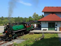 The Portage Flyer rests at Rotary Village Station in Muskoka Heritage Place as passengers de-board after the first run  on the last day of steam ops for 2015.