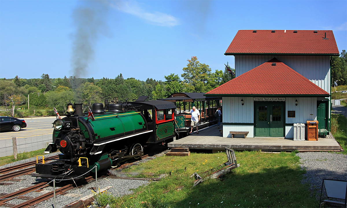 The Portage Flyer rests at Rotary Village Station in Muskoka Heritage Place as passengers de-board after the first run  on the last day of steam ops for 2015.