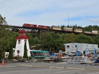 Unknown (by me anyway) CP stack train heading over the Seguin River in Parry Sound.