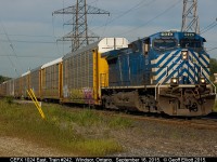 "Blue Bird", CEFX 1024, with Engineer 'Jeromme' on the throttle departs Dougal Ave., in Windsor on September 16, 2015 with a solid 9000+ feet of empty autoracks.