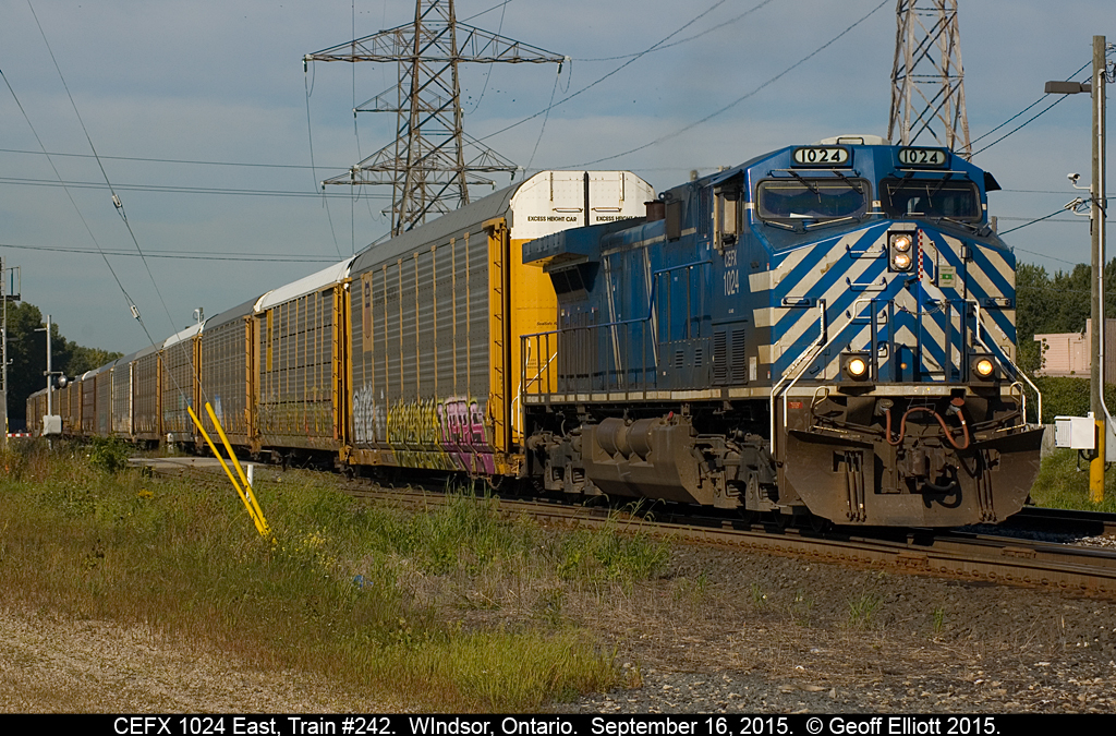 "Blue Bird", CEFX 1024, with Engineer 'Jeromme' on the throttle departs Dougal Ave., in Windsor on September 16, 2015 with a solid 9000+ feet of empty autoracks.