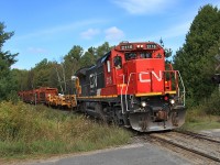 An almost empty CWR train heads down the Newmarket Sub, crossing Beier's Road just north of Kilworthy.