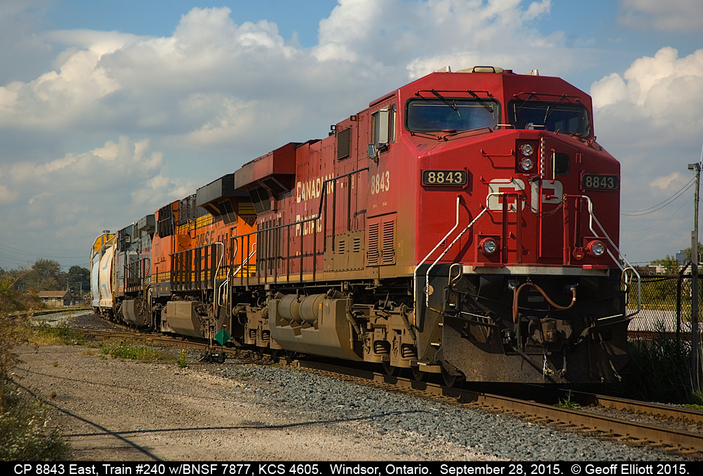 CP Train #240 shoves into Windsor Yard on September 28, 2015 with CP 8843 as the leader, BNSF 7877, and KCS 4605 bringing up the rear for a little touch of "Fall color".....