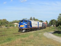 1401 and 1400 lead today's train into the yard at St Thomas where they will interchange traffic with CN.