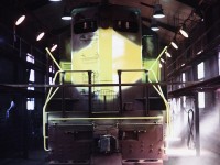 A Northern Alberta railways GP-9 gets its first layer of new paint. One of my brothers shots, taken during a tour.