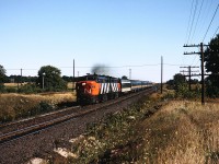 A matched pair of FPA-4's haul 9 cars westbound. One of my Brothers shots.