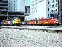Power change at Calgary. 1402, a B unit and RS-10 8558 have just been replaced by 1406, 1965 and 1423. 10 months after taking over CP's passenger services VIA's equipment was still in the rainbow phase.