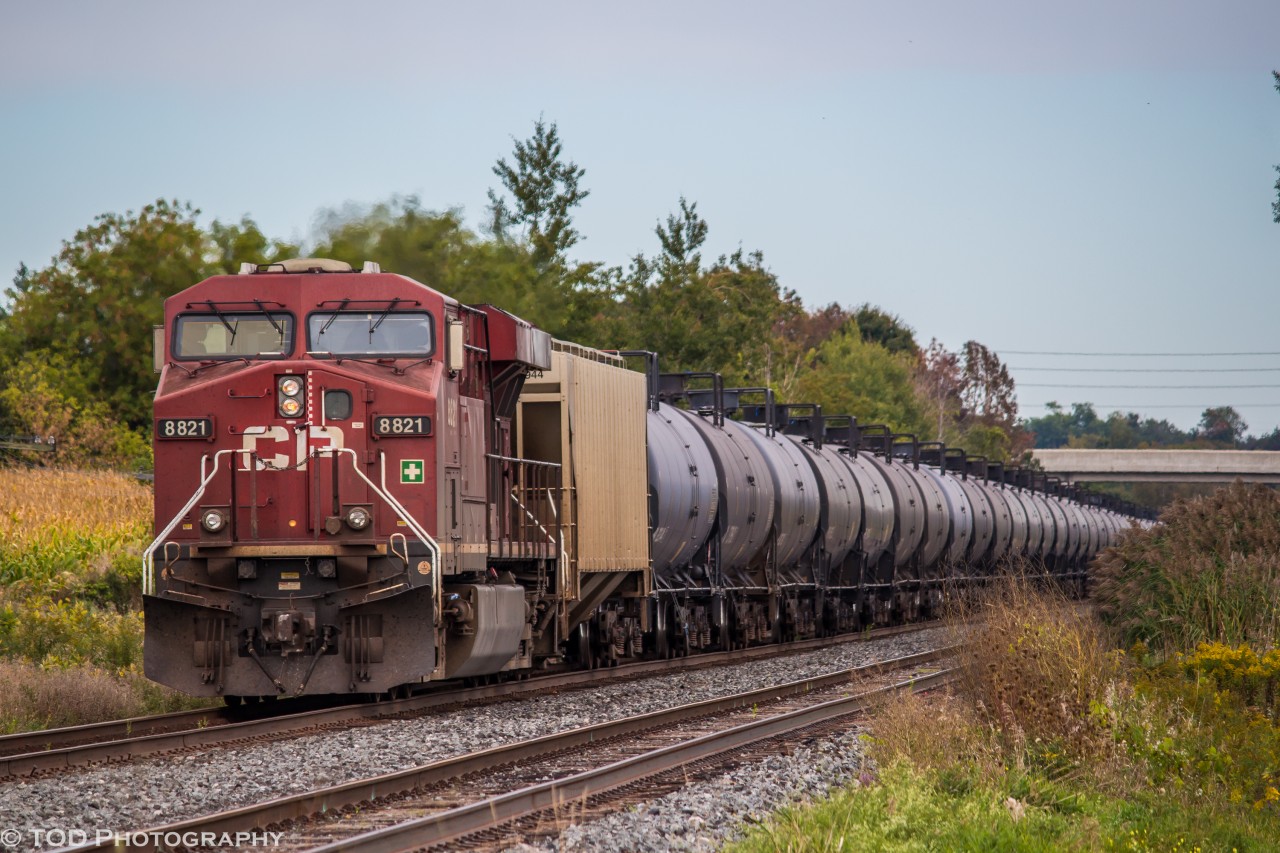 With CP 8774 leading, CP 8821 is on pusher duty on this Eastbound loaded crude oil train.