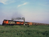 CN HR-616 2109 leads train #414 east on the Halton Sub, just about to cross Mainway. The trailing unit is one of the five B&LE SD9s CN leased for a few months in 1988.