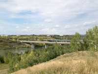 Testing rail across this trestle made it more desirable to shoot a train over it. CN 2242 east makes its way across the trestle over The North Saskatchewan River. 