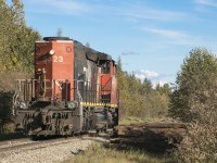 Running light power and long hood forward, CN 505 CN 5323 west is cleared through working limits. 