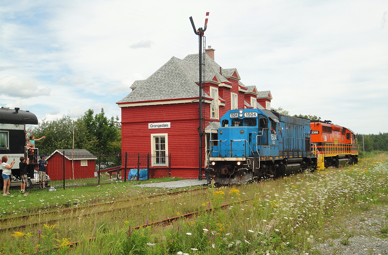 The Last Orangedale whistle With a track inspection expirey date looming two days later the CBCNS decided to move their power off the Sydney subdivision on the 14th. We chased the train from Iona, NS to Orangedale, setting of the Rankin Family song, 'Orangedale Whistle'. The train had many followers and passers by stopping and taking a look at the last train they will see on this strech of line. While stopped at one location I heard a local say to her kids "Look at that and remeber it, because you'll never see it again".