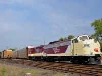 <b>A classy unit on a classy railway.</b> From freshly repainted FP9A OSRX 6508, to how open their crew and even their owner is to railfans, the Ontario Southland is one classy railway. Here during a brief period of sunshine, 6508 and GP9 1620 sit in front of the Woodstock station, awaiting the appearance of CP 244 with autoracks for the GM Cami plant in Ingersoll.