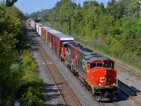 CN 324 for St. Albans, Vermont exits Taschereau Yard with a nice lashup consisting of two clean GP40-2L(W)'s (CN 9416 & CN 9411).