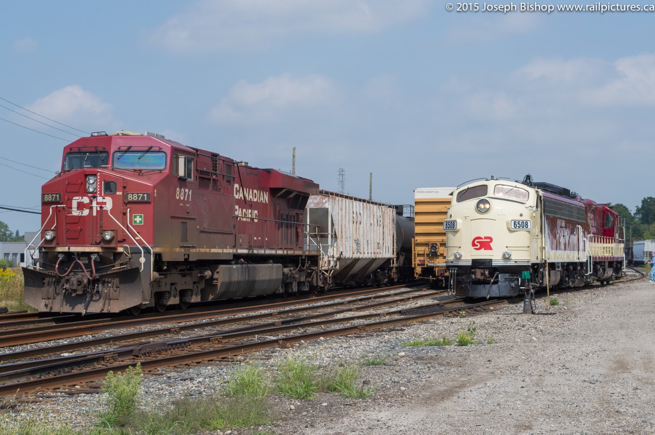 CP 8871 provides the distributed power on EB train 550 through Woodstock.  Sitting in front of the station is OSRX 6508 and OSRX 1620, they would wait for 550 to clear before receiving permission to head out to Coakley.