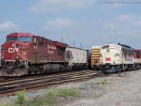 CP 8871 provides the distributed power on EB train 550 through Woodstock.  Sitting in front of the station is OSRX 6508 and OSRX 1620, they would wait for 550 to clear before receiving permission to head out to Coakley.