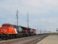 Delivered to CN just a couple of days ago, brand new ET44AC's CN 3017 & CN 3014 leave Belleville Yard with CN 369 after setting off some cars. They will follow CN 149 which left just a few minutes before.