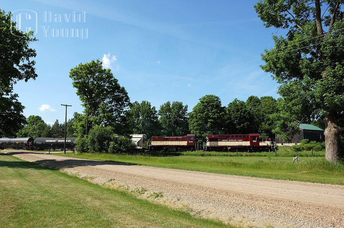 The engineer in charge of one (of the many) vintage fleet of first generation locomotives has his southbound train well in hand as they have finished their switching in Guelph and head for home at Guelph Junction.