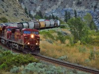 CP grain train 301, quintessentially Canadian, rounds the cures at Martel.