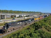 A nice lashup is leading CN 529 towards Taschereau Yard as it approaches Turcot West on the south track of the Montreal sub. Lashup is NS 8780, NS 9292 & UP 8787. While NS power is the norm on this train, UP power is on the rare side.