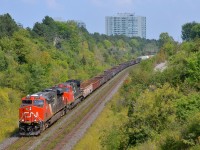 <b>9 month old and 23 year old GE's.</b> Nine month old ES44AC CN 2939 and and twenty-three year old Dash8-40CW CN 2141 (ex-ATSF 812) are the power for CN X371 which is upgrade on the York Sub and nearly at MacMillan Yard, where the train will terminate.