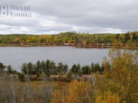 CN C44-9W 2639 and IC SD70 1034 lead grain empties along the shores of Mud Lake east of Kashabowie, Ontario. The train will skirt many little lakes like this while it traverses the rail of the Kashabowie, Fort Frances and Sprague Subs enroute to Winnipeg and points west to their final loading destination on the Canadian Prairie.