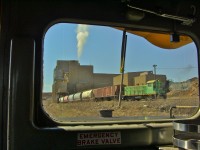 Agrium mine's remote switcher SW1200 7731 spots cars during the arrival of ONT 516. Photo taken from the cab of ONT 2202, uploaded with permission. Agrium mine along with the Agrium sub were shut down shortly after this photo was taken. 