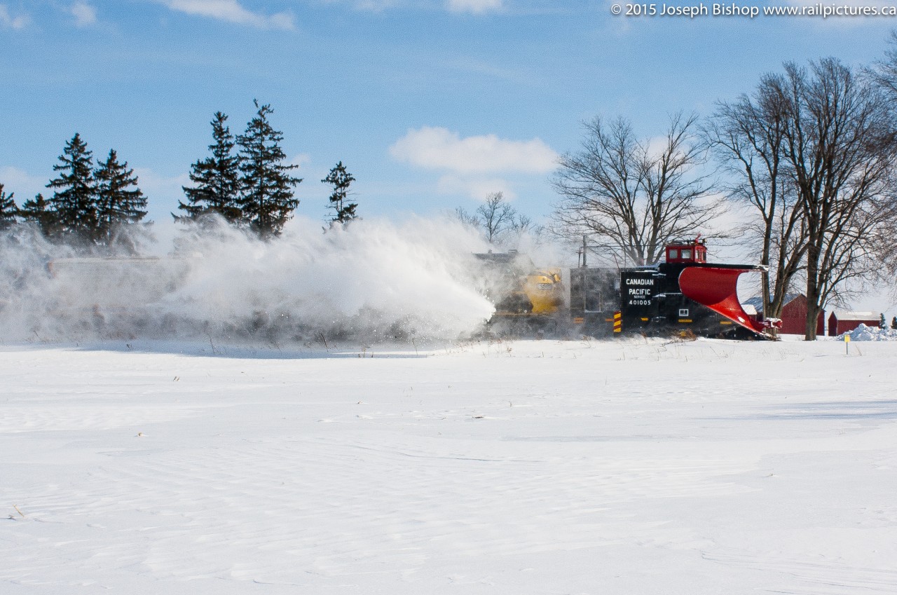 It's Coming   And it is coming faster than some would like...looking through some photos from the past year I came across this one from February of one of the many OSR plow extra's that ran this past winter.  The power was OSRX 6508 and OSRX 1401 though only part of 1401 is visible in the photo.