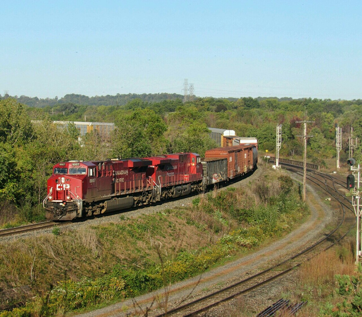 About a half hour after CP 2265 south passed by, CP 246 crawls into the steel city. 8907 leads the short southbound train. Surprisingly, no coil cars on were on 246 that day.