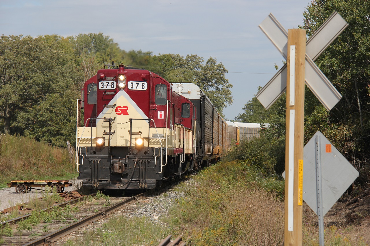Another view of OSRX 378 and 383 backing up racks into Cami on the afternoon of September 27, 2015. Note the little railcar to the left of the photo. Not sure what's up with this? Time - 13:43.