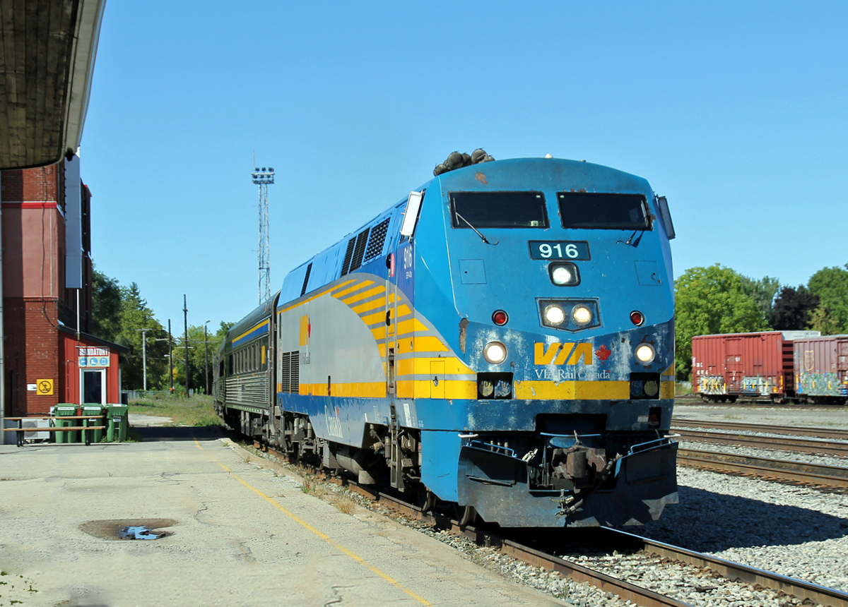 Not stopping at Smiths Falls VIA P42DC cruises past the old station building en route to Toronto.