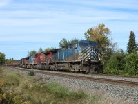 After coming up from Hamilton, CEFX 1059 leads CP 9831, CEFX 1024 and CP 8560 rounds the bend up to Tremaine Rd with a mixed manifest of freight.