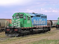 Not Working on this day.  Mobil Grains SD40-3 6935 sits silently in the yard at Aylesbury.