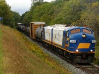 Matching OSR FP9A's 1400 (CN 6539) and 1401 (CN 6523) roll east through Ingersoll, ON with 31 cars for interchange with CP at Woodstock