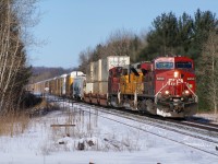 CP 8650 is seen blasting trough Essa (Mile 59) with UP 3736 and CP 9633 trailing. On this day, CP 420 will arrive at Spence, set off 49 cars, and continue south with a very short, and maybe just slightly over powered 10 car consist. Its been a real treat seeing foreign power on the CP lately, bringing some nice contrast to an otherwise very red landscape.