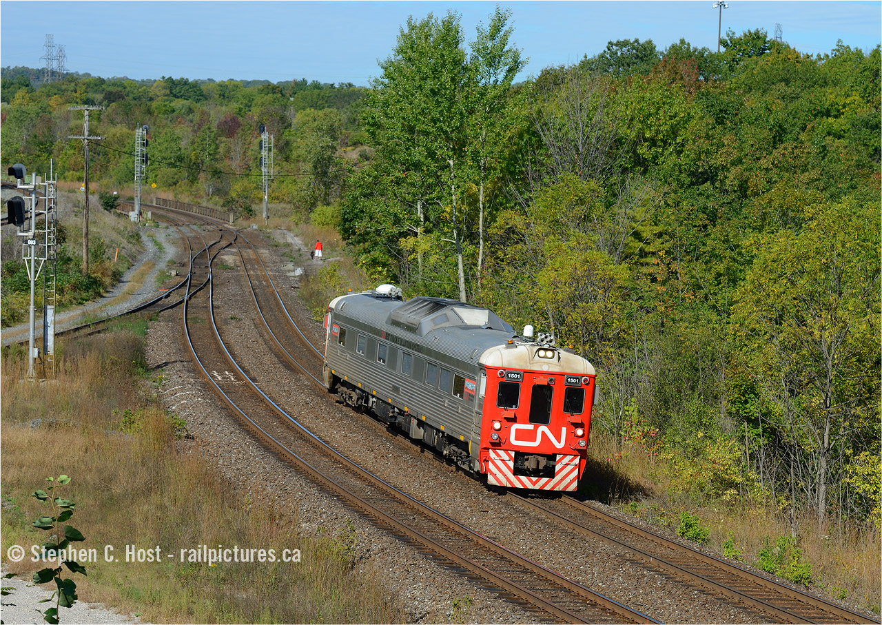 CN 1501, refurbished and rebuilt RDC (ex VIA 6108, ex CN 6108, ex CN D108) now a Geometry car, heads back east to test the three mains of the Oakville sub between the former Hamilton West and Burlington East. This was the only move of the day that brought the RDC onto the Dundas sub. Following testing of the CN owned Oakville Subdivision, the RDC tested to Fort Erie and back.
It's nice to see one more RDC returned to service....  here is a photo of "1501" (as 15106) in 2006 heading to Chicago for complete refurb: http://www.railpictures.ca/?attachment_id=12219