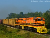 Good Morning - while commuters commute to work (including yours truly) for the 9 to 5 grind, it's 8:50 and GEXR 432 does its daily commute to Toronto, the crew already four hours into their day. 3394 really does look great with 3393, hats off to GW/GEXR management for arranging the paint and making my job easy - clicking a shutter is so difficult when it looks this good. <br><br>I call this location "Tatham Curve" - railfan Paul Tatham once lived in the property behind the engines, and if only one could have put up a classic tall neon sign in the background "Trains, the sensible choice" in some classic 1940's nod to the glory days of passenger rail, we'd have a really cool shot here, but I don't think the current owners would be so willing to put up signage :)