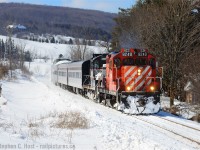<b>This is the last CP GP9 on the CP roster as of 08/2015</b> - Apparently assigned to Moose Jaw - can anyone from Saskatchewan see if it's active, working , or parked somewhere? <br><br>8249 is leading the Credit Valley Explorer Snow Train, passing by the scenic Niagara Escarpment - pinch hitting for CCGX 4009 (trailing) as it had mechanical issues. The dome also adds a touch of class to this train, don't you think?<br><br>8249 was not a good performer on this day and it was quickly returned to CP for GP20C-ECO 2267. I figured that 8249 was done for and would be sent to its death or for conversion to an ECO but in fact it appears to be the very last survivor of this series on the roster today. 8249 is apparently US owned. If you have any further details to the disposition of 8249 please add a comment below, anytime. Thank you.